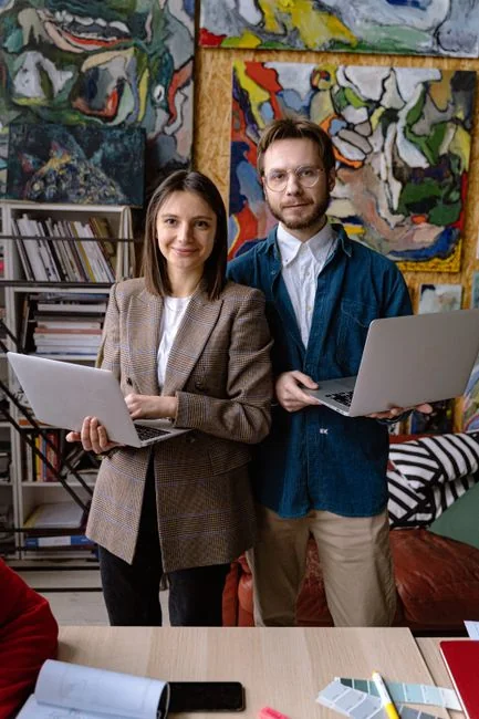 A person using a laptop to browse stock photo websites. Freelancing work in a cozy setting.
